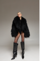 Women's short black fur coat made of natural llama fur